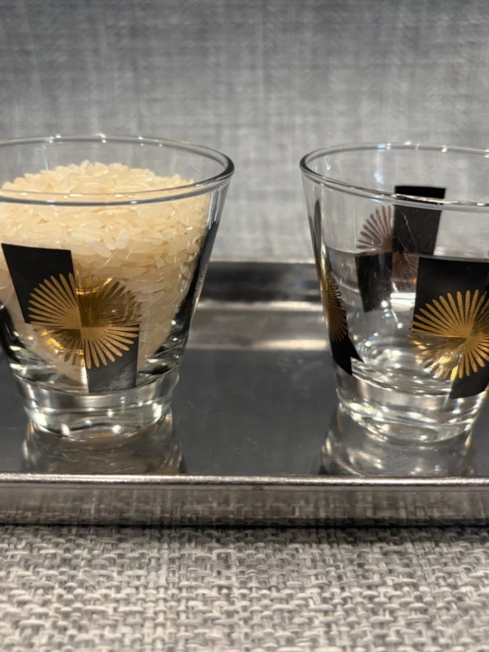 gold & black glass tumbler pouring 1:1 practical life lesson idlewild montessori